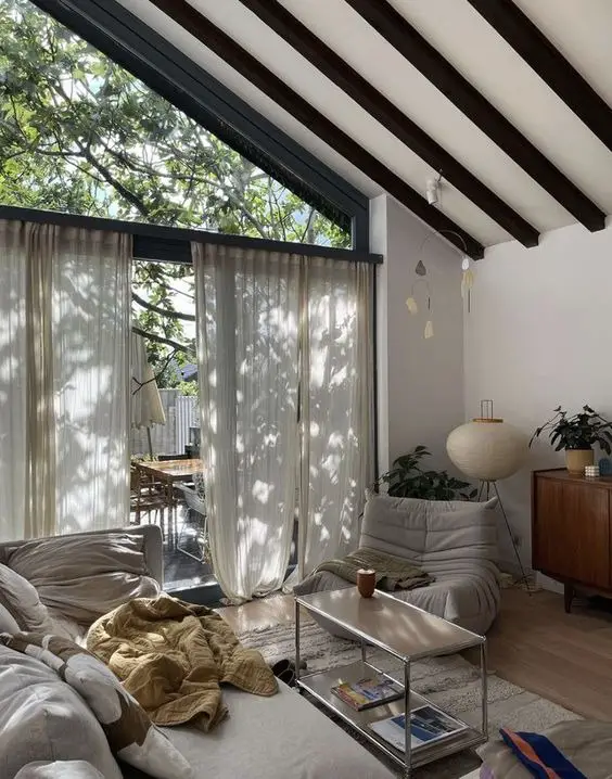 Explore Trendsetting Living Room Designs with Balconies in 2024 | Elevate Your Space with Modern Aesthetics and Indian Flair