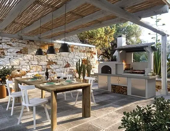Crafting 2024's Backyard Oasis: Farmhouse Elegance in Outdoor Kitchen Design