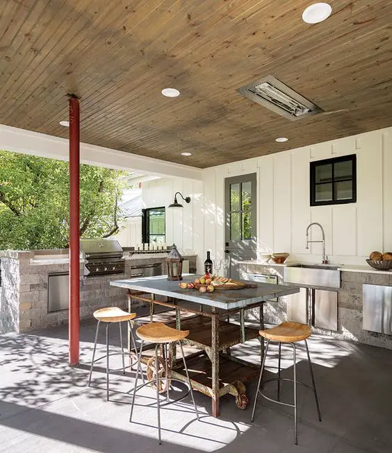 Crafting 2024's Backyard Oasis: Farmhouse Elegance in Outdoor Kitchen Design