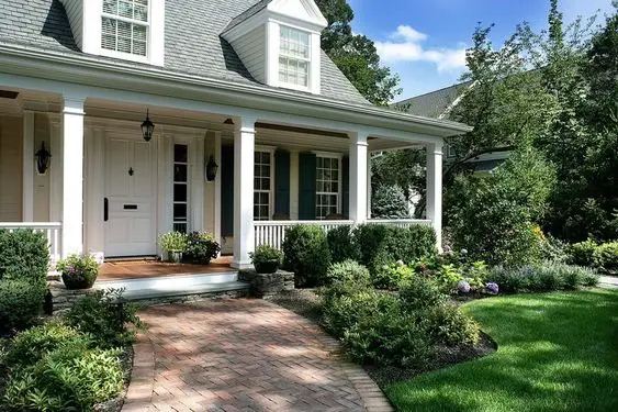 Transform Your Home: 2024 Trends in Low Front Porch Landscaping for a Budget-Friendly, Maintenance-Free Oasis